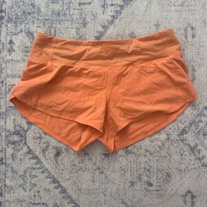 Tangerine Lululemon Speed Up shorts 2.5”